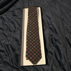 Gucci tie new in box.